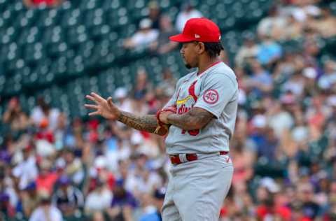 DENVER, CO – JULY 04: Carlos Martinez #18 of the St. Louis Cardinals reacts after an apparent arm injury while pitching against the Colorado Rockies at Coors Field on July 4, 2021 in Denver, Colorado. (Photo by Dustin Bradford/Getty Images)