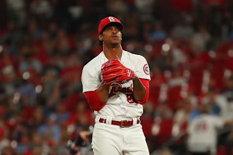 Alex Reyes #29 of the St. Louis Cardinals reacts after walking three consecutive batters against the Atlanta Braves in the eighth inning at Busch Stadium on August 5, 2021 in St Louis, Missouri. (Photo by Dilip Vishwanat/Getty Images)