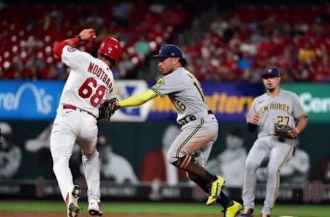 ST LOUIS, MO – AUGUST 17: Kolten Wong #16 of the Milwaukee Brewers tags out Lars Nootbaar #68 of the St. Louis Cardinals in the seventh inning at Busch Stadium on August 17, 2021 in St Louis, Missouri. (Photo by Jeff Curry/Getty Images)