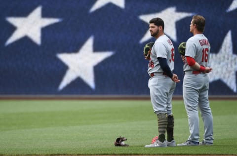 Juan Yepez and Nolan Gorman during the National Anthem. (Photo by Justin Berl/Getty Images)