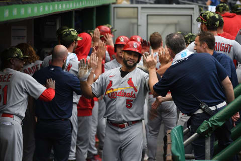 Albert Pujols #5 of the St. Louis Cardinals celebrates with teammates in the dugout after hitting a three-run home run in the ninth inning during the game against the Pittsburgh Pirates at PNC Park on May 22, 2022 in Pittsburgh, Pennsylvania. (Photo by Justin Berl/Getty Images)