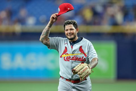 ST. PETERSBURG, FL – JUNE 8: Yadier Molina #4 of the St. Louis Cardinals acknowledges the crowd after pitching a scoreless eighth inning against the Tampa Bay Rays in a baseball game at Tropicana Field on June 8, 2022 in St. Petersburg, Florida. (Photo by Mike Carlson/Getty Images)