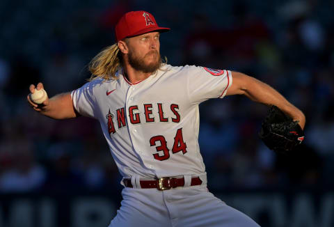 ANAHEIM, CA – JUNE 20: Noah Syndergaard #34 of the Los Angeles Angels pitches in the third inning against the Kansas City Royals at Angel Stadium of Anaheim on June 20, 2022 in Anaheim, California. (Photo by Jayne Kamin-Oncea/Getty Images)