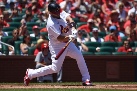 ST LOUIS, MO – JULY 10: Albert Pujols #5 of the St. Louis Cardinals hits a single against the Philadelphia Phillies in the second inning at Busch Stadium on July 10, 2022 in St Louis, Missouri. (Photo by Joe Puetz/Getty Images)