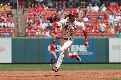 ST LOUIS, MO – JULY 16: Dylan Carlson #3 of the St. Louis Cardinals runs out an RBI triple against the Cincinnati Reds in the third inning at Busch Stadium on July 16, 2022 in St Louis, Missouri. (Photo by Dilip Vishwanat/Getty Images)