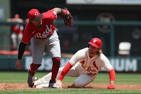 ST LOUIS, MO – JULY 16: Jonathan India #6 of the Cincinnati Reds attempts to field a ground ball as Brendan Donovan #33 of the St. Louis Cardinals slides safely into second base in the second inning at Busch Stadium on July 16, 2022 in St Louis, Missouri. (Photo by Dilip Vishwanat/Getty Images)