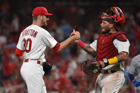 ST LOUIS, MO – AUGUST 02: Chris Stratton #30 of the St. Louis Cardinals and Yadier Molina #4 of the St. Louis Cardinals celebrate their teams 6-0 victory over the Chicago Cubs at Busch Stadium on August 2, 2022 in St Louis, Missouri. (Photo by Joe Puetz/Getty Images)