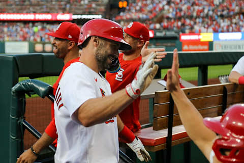 ST. LOUIS, MO – AUGUST 12: Paul Goldschmidt #46 of the St. Louis Cardinals is congratulated by teammates in the dugout after hitting a two-run home run during the first inning against the Milwaukee Brewers at Busch Stadium on August 12, 2022 in St. Louis, Missouri. (Photo by Scott Kane/Getty Images)