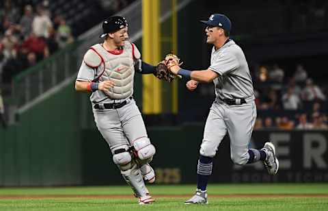 PITTSBURGH, PA – SEPTEMBER 09: Andrew Knizner #7 of the St. Louis Cardinals celebrates with Lars Nootbaar #21 after turning a double play in the seventh inning during the game against the Pittsburgh Pirates at PNC Park on September 9, 2022 in Pittsburgh, Pennsylvania. Both teams are wearing throwback uniforms honoring the Negro Leagues. (Photo by Justin Berl/Getty Images)