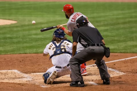 MILWAUKEE, WISCONSIN – SEPTEMBER 16: Matt Carpenter #13 of the St. Louis Cardinals attempts a bunt in the second inning against the Milwaukee Brewers during game two of a doubleheader at Miller Park on September 16, 2020 in Milwaukee, Wisconsin. (Photo by Dylan Buell/Getty Images)