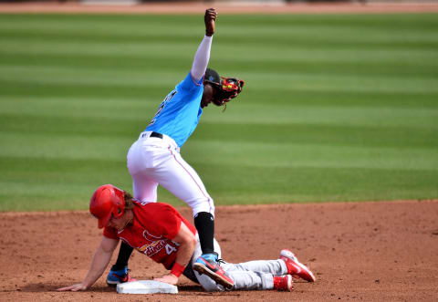 JUPITER, FLORIDA – MARCH 02: Harrison Bader #48 of the St. Louis Cardinals gets caught stealing as he slides into Jazz Chisholm #2 of the Miami Marlins in the third inning in a spring training game at Roger Dean Chevrolet Stadium on March 02, 2021 in Jupiter, Florida. (Photo by Mark Brown/Getty Images)