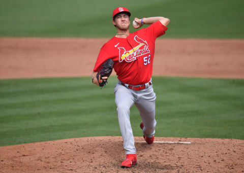 Matthew Liberatore #52 of the St. Louis Cardinals delivers a pitch against the Miami Marlins in a spring training game at Roger Dean Chevrolet Stadium on March 02, 2021 in Jupiter, Florida. (Photo by Mark Brown/Getty Images)