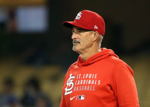 LOS ANGELES, CALIFORNIA – MAY 31: Pitching coach Mike Maddux #31 of the St. Louis Cardinals walks to the mound during the sixth inning against the Los Angeles Dodgers at Dodger Stadium on May 31, 2021 in Los Angeles, California. (Photo by Katelyn Mulcahy/Getty Images)