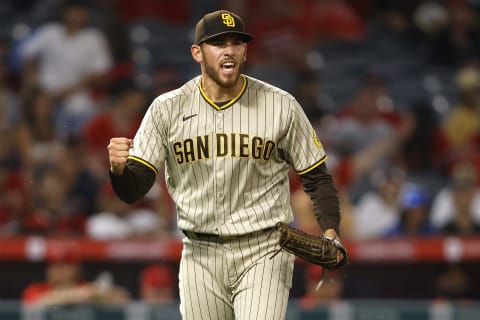 ANAHEIM, CALIFORNIA – AUGUST 27: Joe Musgrove #44 of the San Diego Padres reacts to David Fletcher #22 of the Los Angeles Angels grounding out to end the eighth inning of a game at Angel Stadium of Anaheim on August 27, 2021 in Anaheim, California. (Photo by Sean M. Haffey/Getty Images)