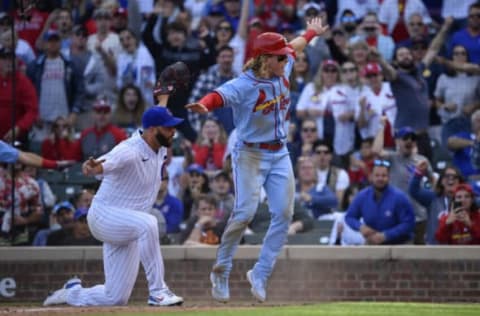 CHICAGO, ILLINOIS – SEPTEMBER 25: Harrison Bader #48 of the St. Louis Cardinals reacts after scoring on a passed ball in the night inning against Tommy Nance #45 of the Chicago Cubs at Wrigley Field on September 25, 2021 in Chicago, Illinois. (Photo by Quinn Harris/Getty Images)