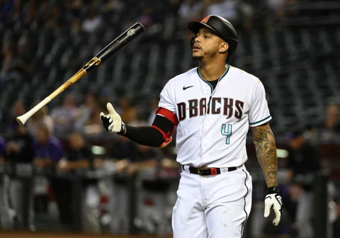 PHOENIX, ARIZONA – OCTOBER 01: Ketel Marte #4 of the Arizona Diamondbacks tosses his bat after being called out on strikes against the Colorado Rockies during the first inning at Chase Field on October 01, 2021 in Phoenix, Arizona. (Photo by Norm Hall/Getty Images)