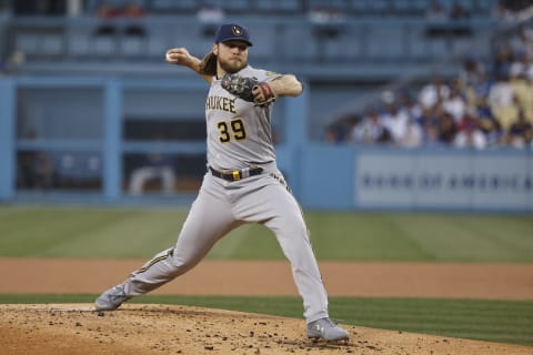 LOS ANGELES, CALIFORNIA – OCTOBER 02: CoRBIn Burnes #39 of the Milwaukee Brewers pitches against the Los Angeles Dodgers during the first inning at Dodger Stadium on October 02, 2021 in Los Angeles, California. (Photo by Michael Owens/Getty Images)