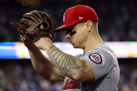 Tyler O’Neill #27 of the St. Louis Cardinals reacts as he walks to the dugout after their 3 to 1 loss to the Los Angeles Dodgers during the National League Wild Card Game at Dodger Stadium on October 06, 2021 in Los Angeles, California. (Photo by Harry How/Getty Images)