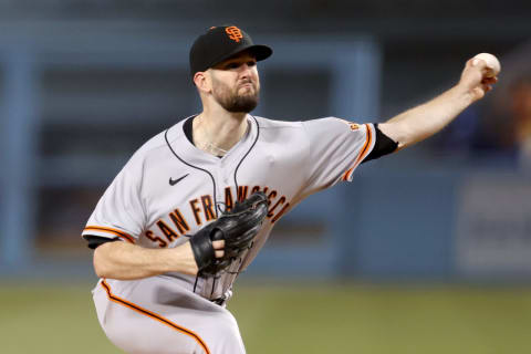 LOS ANGELES, CALIFORNIA – OCTOBER 11: Alex Wood #57 of the San Francisco Giants pitches during the first inning against the Los Angeles Dodgers in game 3 of the National League Division Series at Dodger Stadium on October 11, 2021 in Los Angeles, California. (Photo by Ronald Martinez/Getty Images)