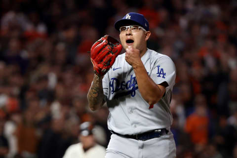 SAN FRANCISCO, CALIFORNIA – OCTOBER 14: Julio Urias #7 of the Los Angeles Dodgers reacts after the third out of the fourth inning against Wilmer Flores #41 of the San Francisco Giants in game 5 of the National League Division Series at Oracle Park on October 14, 2021 in San Francisco, California. (Photo by Harry How/Getty Images)