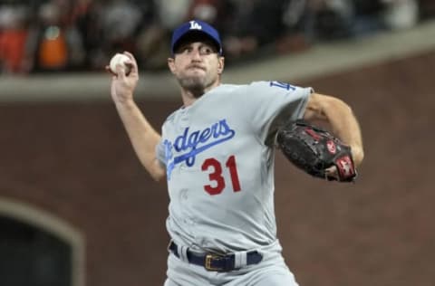 SAN FRANCISCO, CALIFORNIA – OCTOBER 14: Max Scherzer #31 of the Los Angeles Dodgers pitches against the San Francisco Giants during the ninth inning in game 5 of the National League Division Series at Oracle Park on October 14, 2021 in San Francisco, California. (Photo by Thearon W. Henderson/Getty Images)