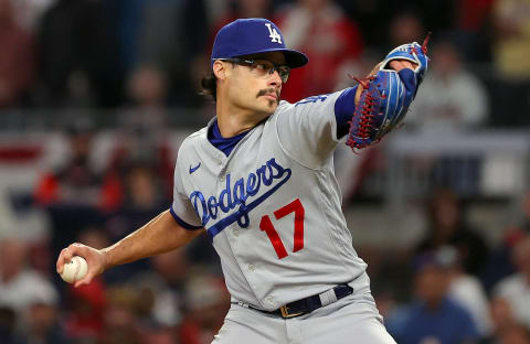 Joe Kelly #17 of the Los Angeles Dodgers pitches against the Atlanta Braves in the sixth inning of Game Two of the National League Championship Series at Truist Park on October 17, 2021 in Atlanta, Georgia. (Photo by Kevin C. Cox/Getty Images)