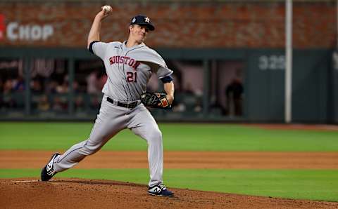 Zack Greinke #21 of the Houston Astros delivers the pitch against the Atlanta Braves in Game Four of the World Series at Truist Park on October 30, 2021 in Atlanta, Georgia. (Photo by Kevin C. Cox/Getty Images)