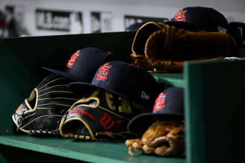 CINCINNATI, OHIO – APRIL 22: A detail view of St. Louis Cardinals hats in the dugout during the game against the Cincinnati Reds at Great American Ball Park on April 22, 2022 in Cincinnati, Ohio. (Photo by Dylan Buell/Getty Images)