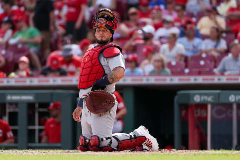 Yadier Molina #4 of the St. Louis Cardinals looks on in the eighth inning against the Cincinnati Reds at Great American Ball Park on April 24, 2022 in Cincinnati, Ohio. (Photo by Dylan Buell/Getty Images)