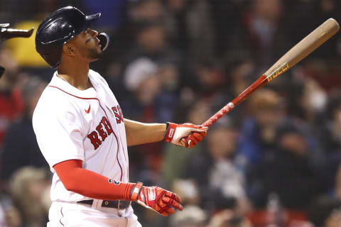 BOSTON, MA – MAY 04: Xander Bogaerts #2 of the Boston Red Sox hits a solo home run in the eighth inning of a game against the Los Angeles Angels Fenway Park on May 4, 2022 in Boston, Massachusetts. (Photo by Adam Glanzman/Getty Images)