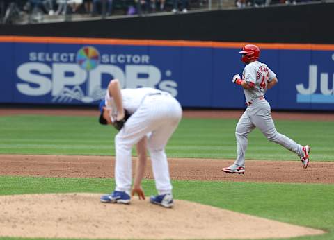 NEW YORK, NEW YORK – MAY 19: Paul Goldschmidt #46 of the St. Louis Cardinals rounds the bases against Chris Bassitt #40 of the New York Mets after hitting a home run in the third inning during their game at Citi Field on May 19, 2022 in New York City. (Photo by Al Bello/Getty Images)