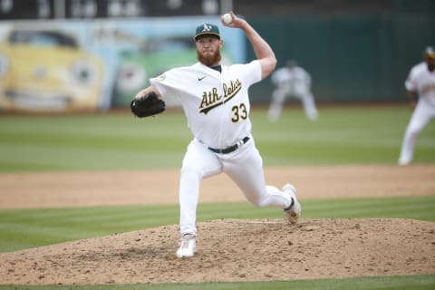 OAKLAND, CA – JUNE 4: A.J. Puk #33 of the Oakland Athletics pitches during the game against the Boston Red Sox at RingCentral Coliseum on June 4, 2022 in Oakland, California. The Red Sox defeated the Athletics 8-0. (Photo by Michael Zagaris/Oakland Athletics/Getty Images)