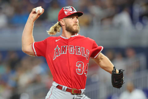 MIAMI, FLORIDA – JULY 05: Noah Syndergaard #34 of the Los Angeles Angels delivers a pitch during the first inning against the Miami Marlins at loanDepot park on July 05, 2022 in Miami, Florida. (Photo by Michael Reaves/Getty Images)