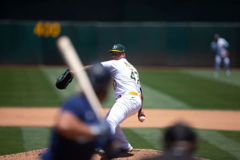 OAKLAND, CA – JUNE 23: Frankie Montas #47 of the Oakland Athletics pitches during the game against the Seattle Mariners at RingCentral Coliseum on June 23, 2022 in Oakland, California. The Mariners defeated the Athletics 2-1. (Photo by Michael Zagaris/Oakland Athletics/Getty Images)