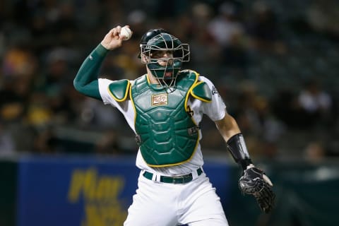 OAKLAND, CALIFORNIA – JULY 05: Catcher Sean Murphy #12 of the Oakland Athletics fields the ball against the Toronto Blue Jays at RingCentral Coliseum on July 05, 2022 in Oakland, California. (Photo by Lachlan Cunningham/Getty Images)