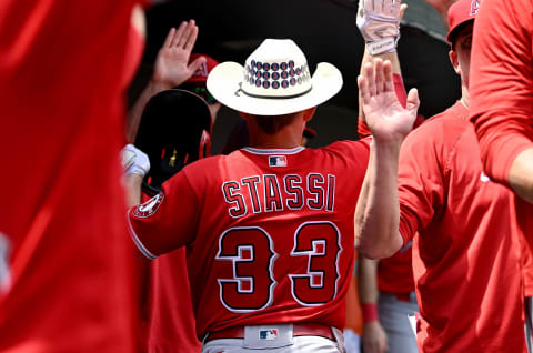 BALTIMORE, MARYLAND – JULY 10: Max Stassi #33 of the Los Angeles Angels celebrates with teammates after hitting a home run against the Baltimore Orioles at Oriole Park at Camden Yards on July 10, 2022 in Baltimore, Maryland. (Photo by G Fiume/Getty Images)