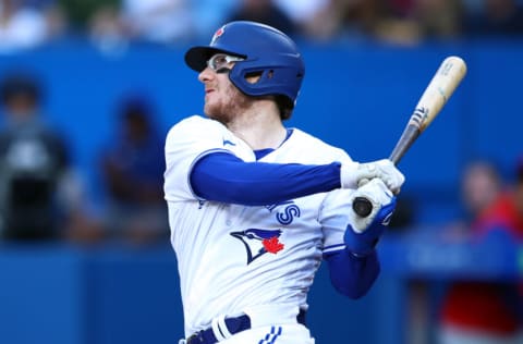 TORONTO, ON - JULY 12: Danny Jansen #9 of the Toronto Blue Jays bats against the Philadelphia Phillies at Rogers Centre on July 12, 2022 in Toronto, Ontario, Canada. (Photo by Vaughn Ridley/Getty Images)