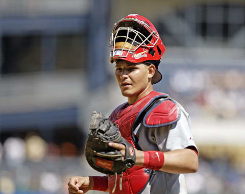 PITTSBURGH, PA – AUGUST 28: Catcher Yadier Molina of the St. Louis Cardinals looks on from the field during a Major League Baseball game against the Pittsburgh Pirates at PNC Park on August 28, 2004 in Pittsburgh, Pennsylvania. The Cardinals defeated the Pirates 6-4. (Photo by George Gojkovich/Getty Images)