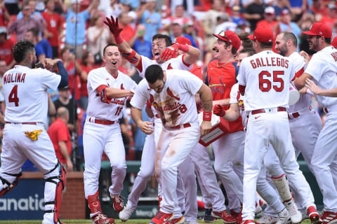 ST LOUIS, MO – AUGUST 04: Lars Nootbaar #21 of the St. Louis Cardinals is congratulated after hitting a walk-off single against the Chicago Cubs in game one of a double header at Busch Stadium on August 4, 2022 in St Louis, Missouri. (Photo by Joe Puetz/Getty Images)