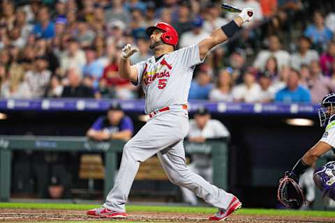 DENVER, COLORADO – AUGUST 10: Albert Pujols #5 of the St. Louis Cardinals hits career home run number 687 against the Colorado Rockies at Coors Field on August 10, 2022 in Denver, Colorado.(Photo by Harrison Barden/Colorado Rockies/Getty Images)