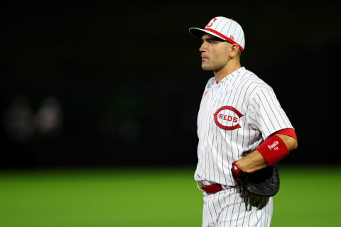 Joey Votto #19 of the Cincinnati Reds looks on during the eighth inning of the game against the Chicago Cubs. (Photo by Michael Reaves/Getty Images)