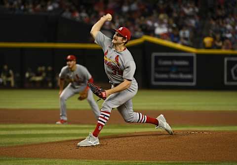 PHOENIX, ARIZONA – AUGUST 19: Miles Mikolas #39 of the St Louis Cardinals delivers a first inning pitch against the Arizona Diamondbacks at Chase Field on August 19, 2022 in Phoenix, Arizona. (Photo by Norm Hall/Getty Images)