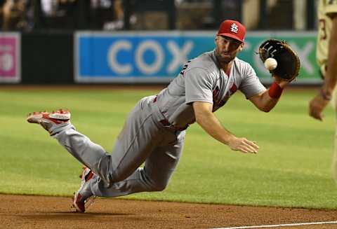 PHOENIX, ARIZONA – AUGUST 19: Paul Goldschmidt #46 of the St Louis Cardinals makes a diving stop on a ground ball hit by Geraldo Perdomo #2 of the Arizona Diamondbacks during the eighth inning at Chase Field on August 19, 2022 in Phoenix, Arizona. Perdomo was forced out at first base and the Cardinals won 5-1. (Photo by Norm Hall/Getty Images)