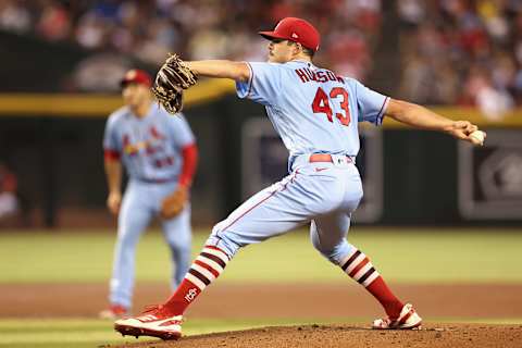 PHOENIX, ARIZONA – AUGUST 20: Starting pitcher Dakota Hudson #43 of the St. Louis Cardinals pitches against the Arizona Diamondbacks during the first inning of the MLB game at Chase Field on August 20, 2022 in Phoenix, Arizona. (Photo by Christian Petersen/Getty Images)