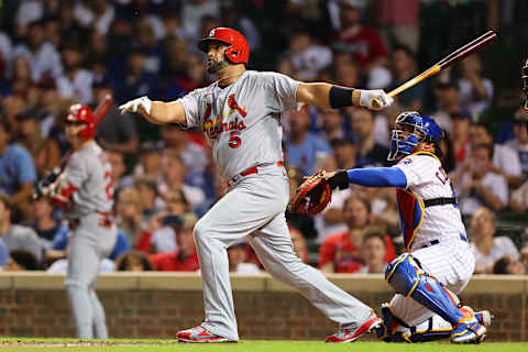 CHICAGO, ILLINOIS – AUGUST 22: Albert Pujols #5 of the St. Louis Cardinals hits a solo home run during the seventh inning off Drew Smyly #11 of the Chicago Cubs (not pictured) at Wrigley Field on August 22, 2022 in Chicago, Illinois. (Photo by Michael Reaves/Getty Images)