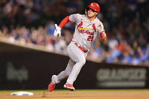 CHICAGO, ILLINOIS – AUGUST 24: Corey Dickerson #25 of the St. Louis Cardinals runs to third base against the Chicago Cubs during the fourth inning at Wrigley Field on August 24, 2022 in Chicago, Illinois. (Photo by Michael Reaves/Getty Images)