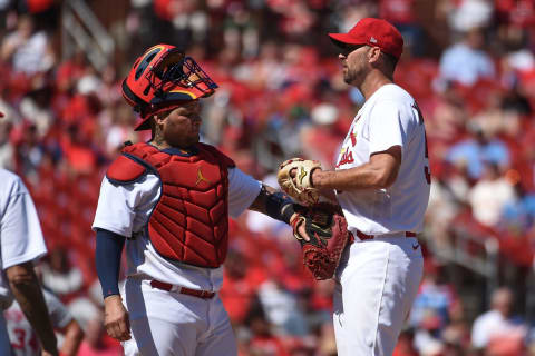 ST LOUIS, MO – SEPTEMBER 08: Yadier Molina #4 of the St. Louis Cardinals speaks with Adam Wainwright #50 of the St. Louis Cardinals during a game against the Washington Nationals at Busch Stadium on September 8, 2022 in St Louis, Missouri. (Photo by Joe Puetz/Getty Images)