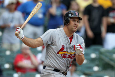 MILWAUKEE, WI – JULY 18: Lance Berkman #12 of the St. Louis Cardinals makes some contact at the plate against the Milwaukee Brewers at Miller Park on July 18, 2012 in Milwaukee, Wisconsin. (Photo by Mike McGinnis/Getty Images)