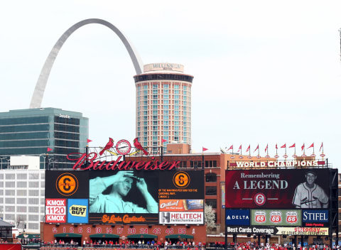 ST. LOUIS, MO – APRIL 08: St. Louis Cardinals legend Stan Musial is remembered in a pregame ceremony before the Opening Day game between the St. Louis Cardinals and the Cincinnati Reds on April 8, 2013 at Busch Stadium in St. Louis, Missouri. (Photo by Elsa/Getty Images)