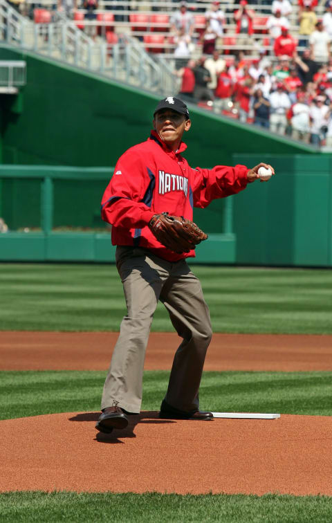 WASHINGTON – APRIL 05: U.S. President Barack Obama throws out the opening pitch before the game between the Philadelphia Phillies and the Washington Nationals on Opening Day at Nationals Park on April 5, 2010 in Washington, DC. (Photo by Martin H. Simon-Pool/Getty Images)